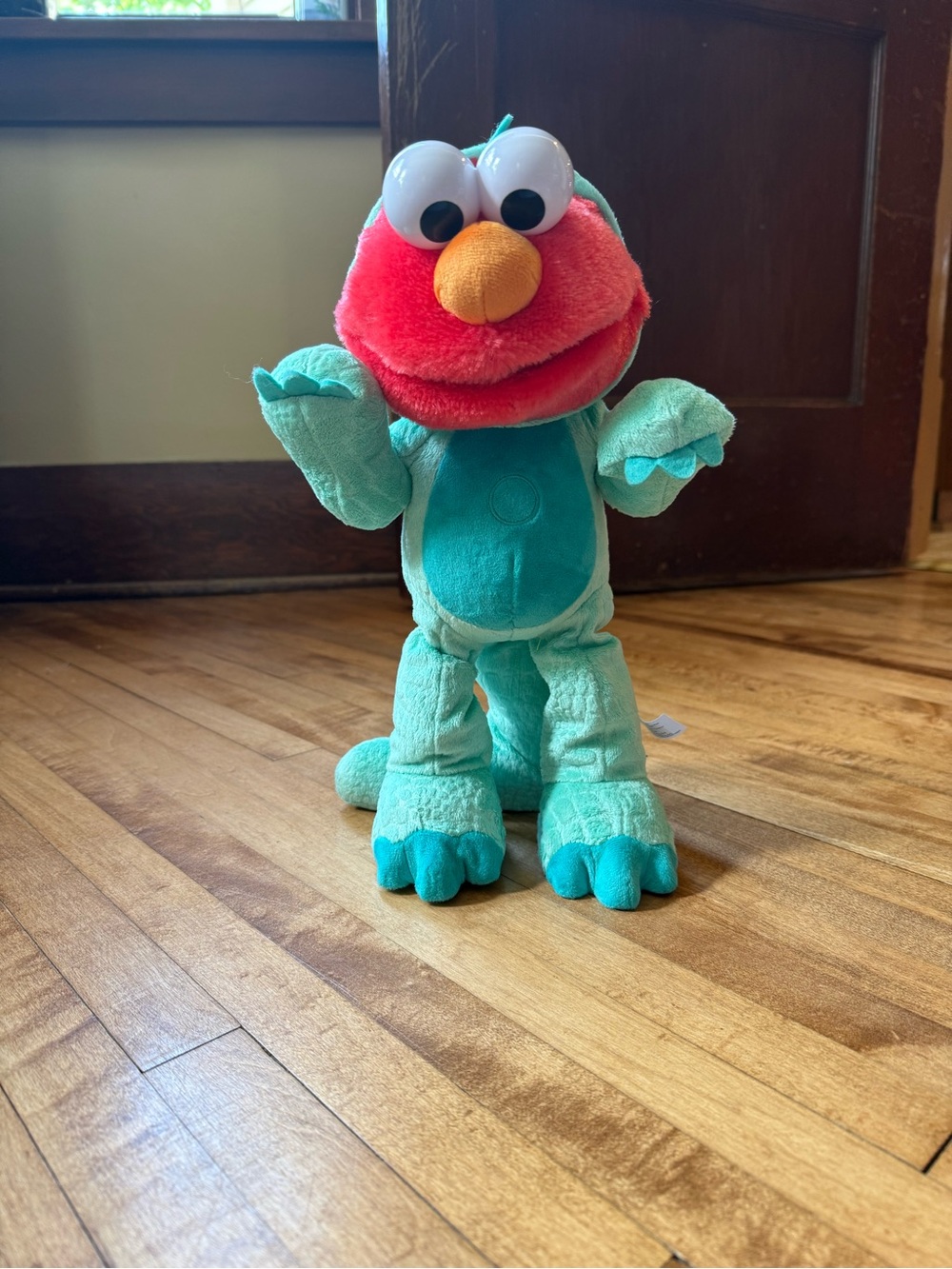 Dino Stomp Elmo Plush-Sings and dances